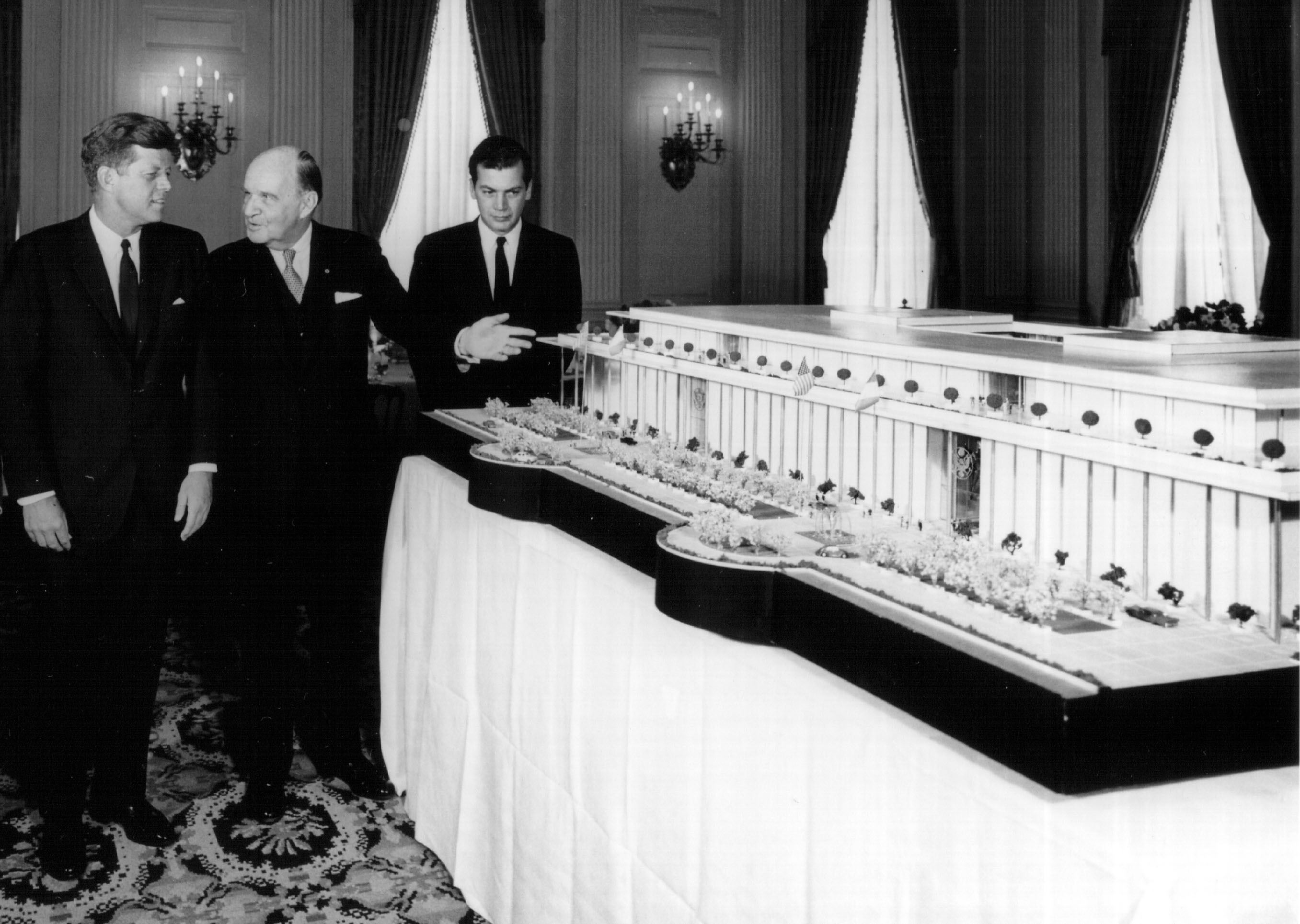 President John F. Kennedy, left, looks at a model of what was later named the Kennedy Center in Washington, DC., in 1963.